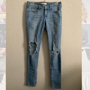 Distressed low rise denim jeans